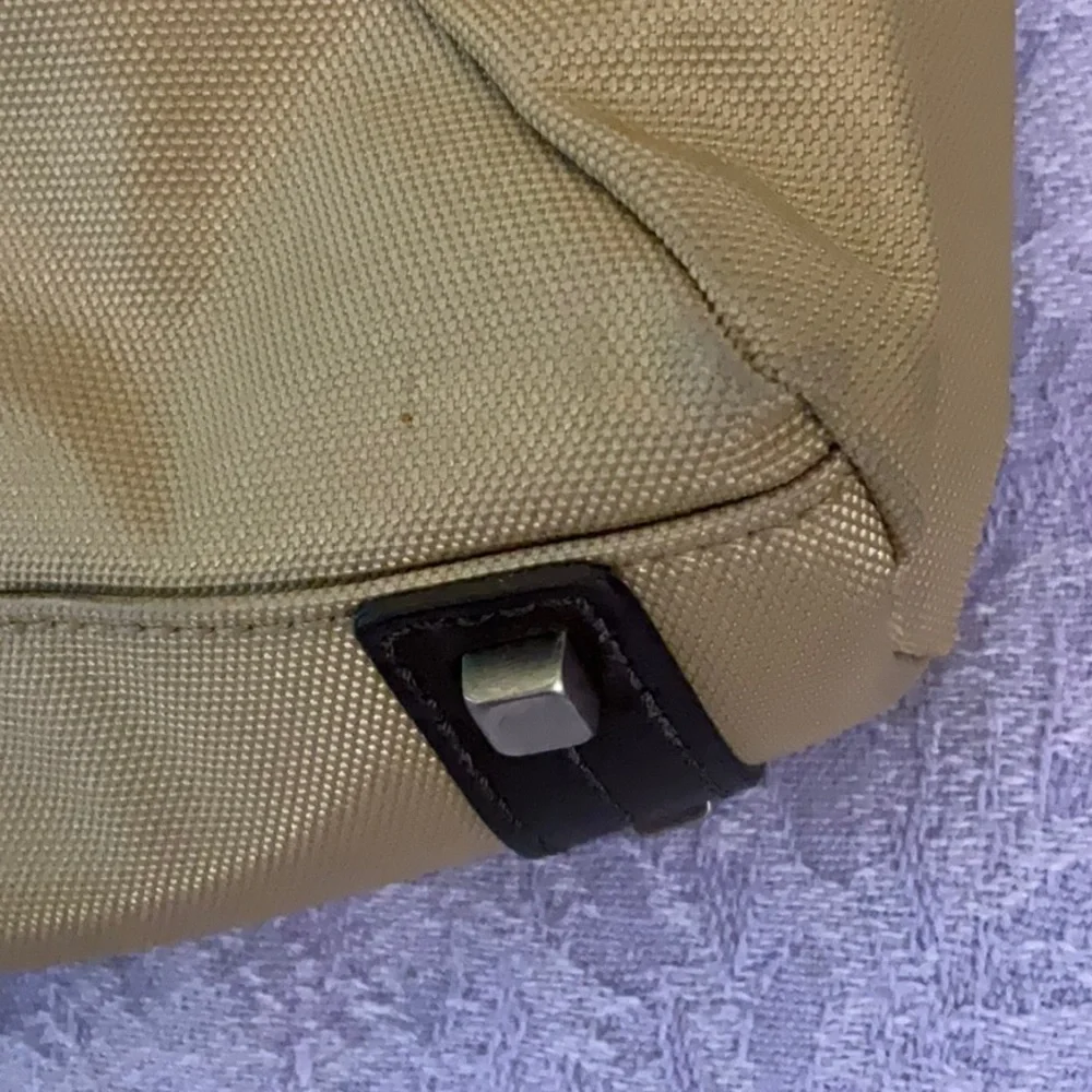 Tumi Tan and Black Briefcase with Durable Design
